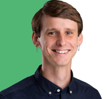 Connor-Murphy-headshot-green Headshot of man in a button down shirt